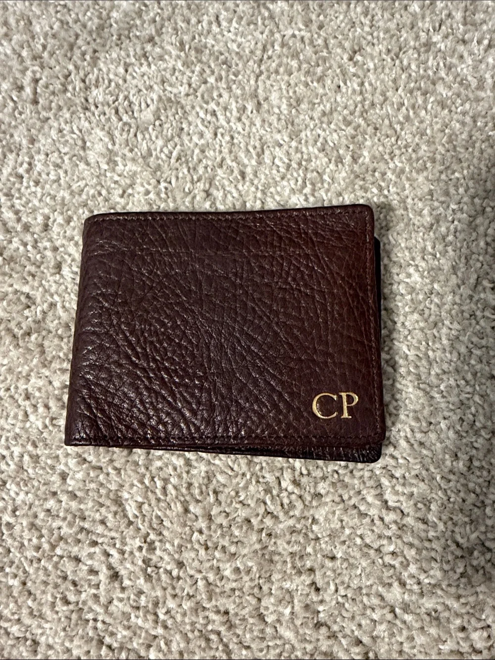 Monogrammed CP Brown Leather Men's Bifold Wallet with flap.